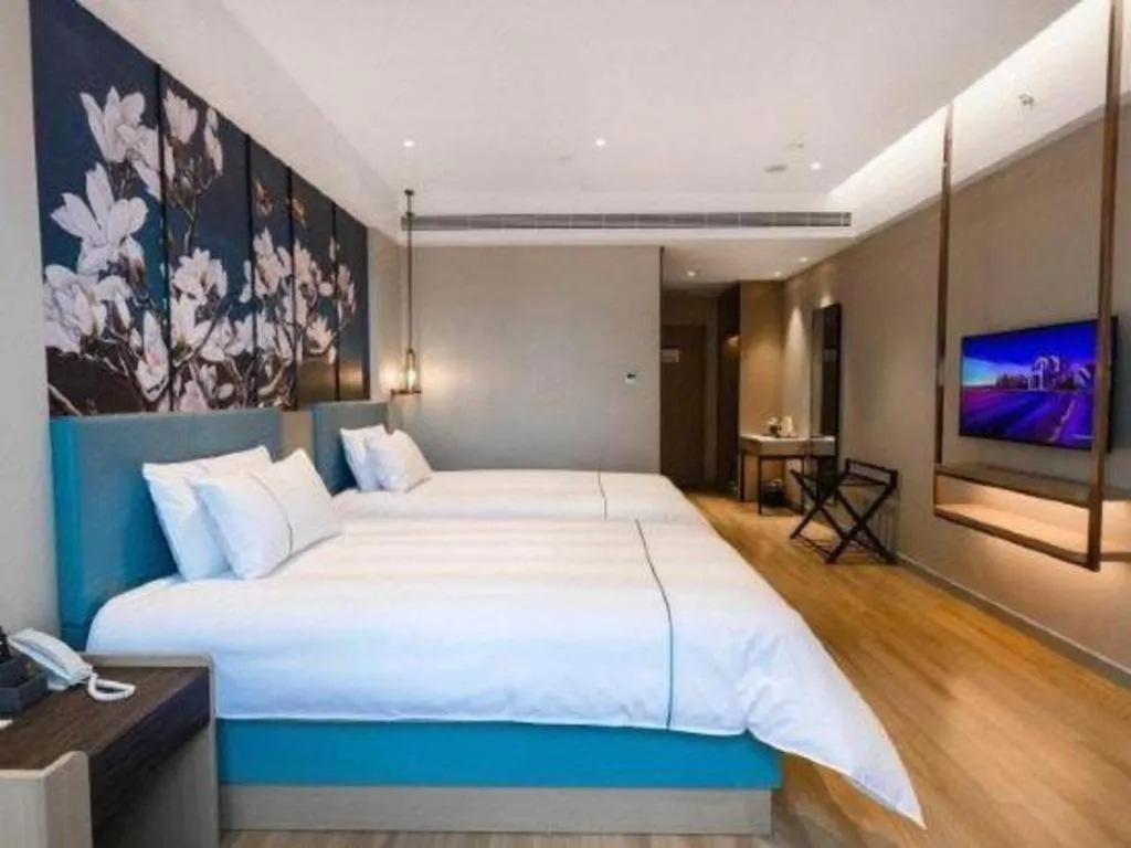 Bed in Magnotel Hotel Guangyuan Nanhe Bus Station Beijing Road