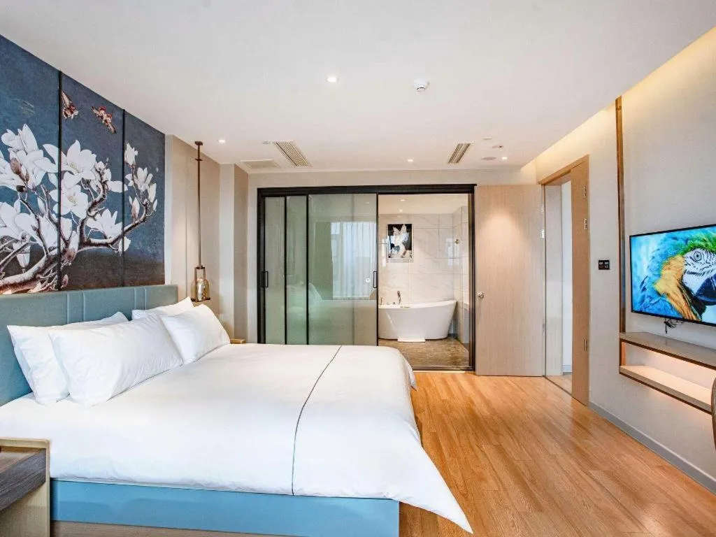 Bed in Magnotel Hotel Guangyuan Nanhe Bus Station Beijing Road