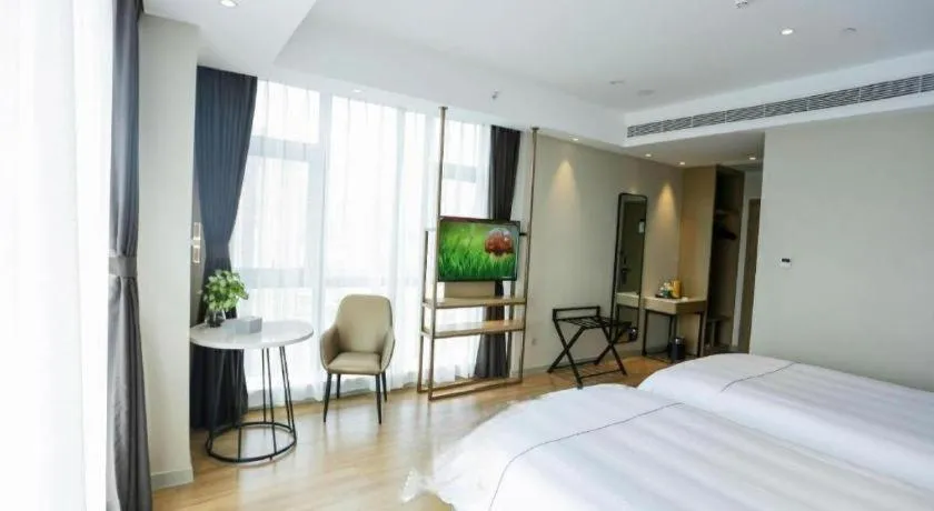 Bed in Magnotel Hotel Guangyuan Nanhe Bus Station Beijing Road