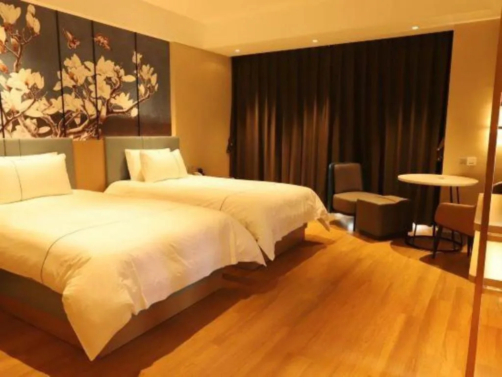 Bed in Magnotel Hotel Guangyuan Nanhe Bus Station Beijing Road