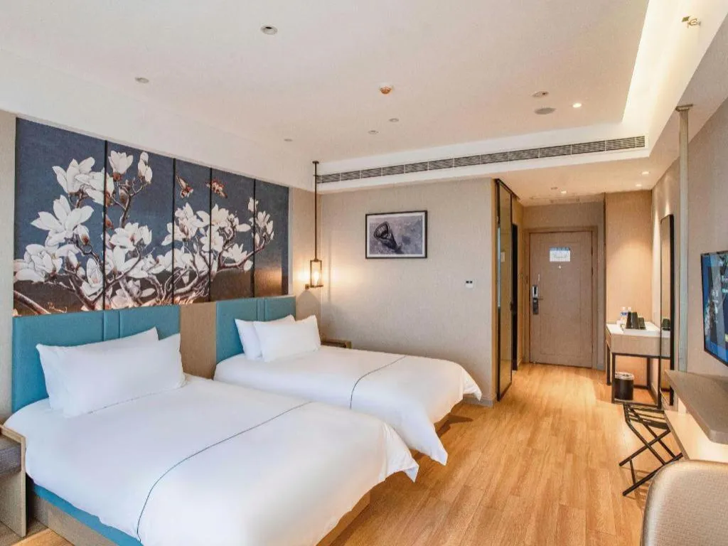 Bed in Magnotel Hotel Guangyuan Nanhe Bus Station Beijing Road