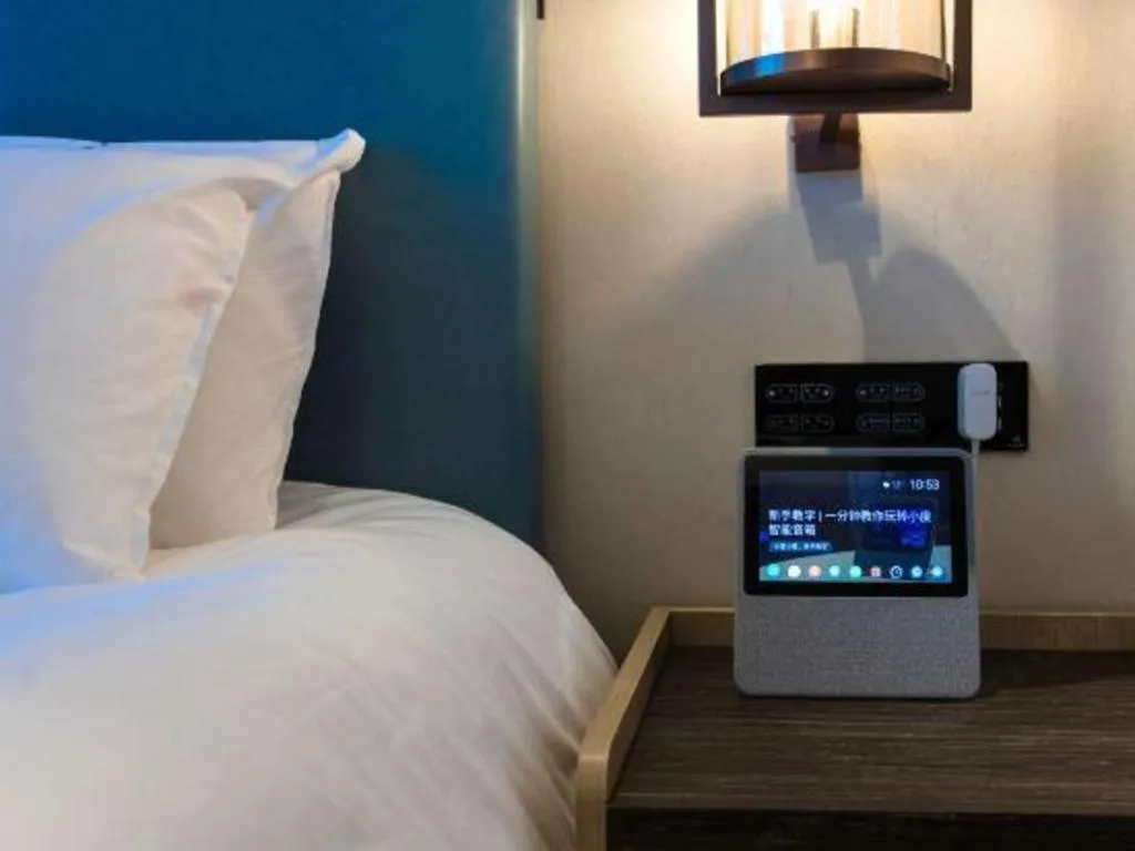 Bed in Magnotel Hotel Guangyuan Nanhe Bus Station Beijing Road