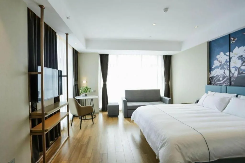 Bed in Magnotel Hotel Guangyuan Nanhe Bus Station Beijing Road