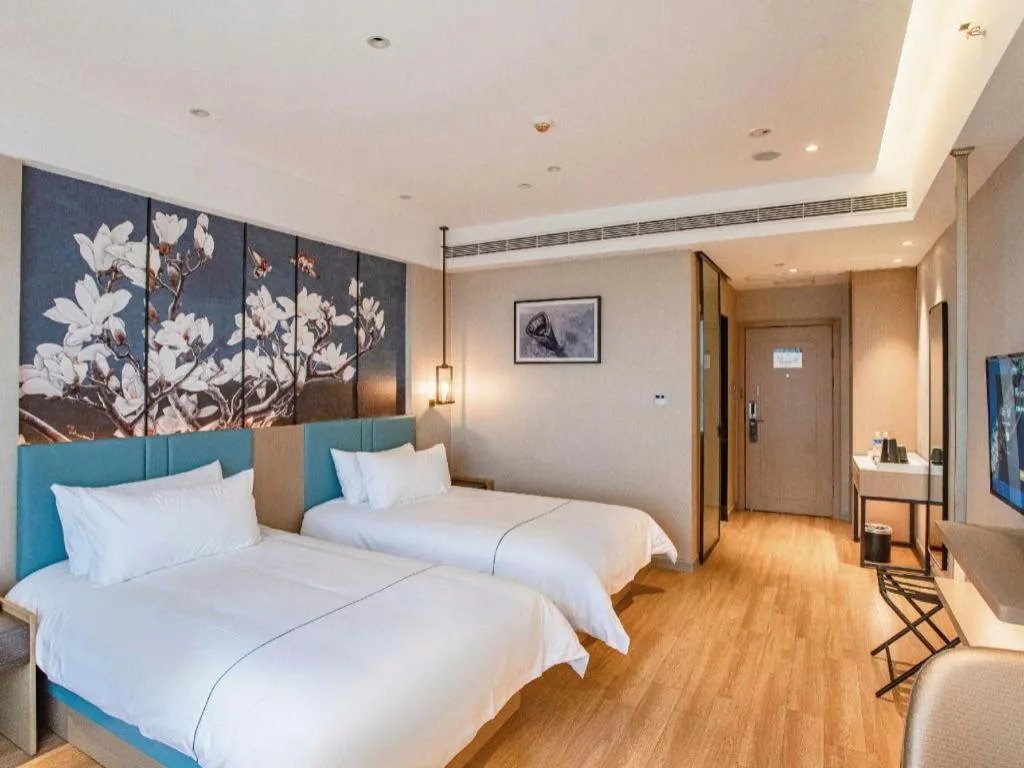 Bed in Magnotel Hotel Guangyuan Nanhe Bus Station Beijing Road