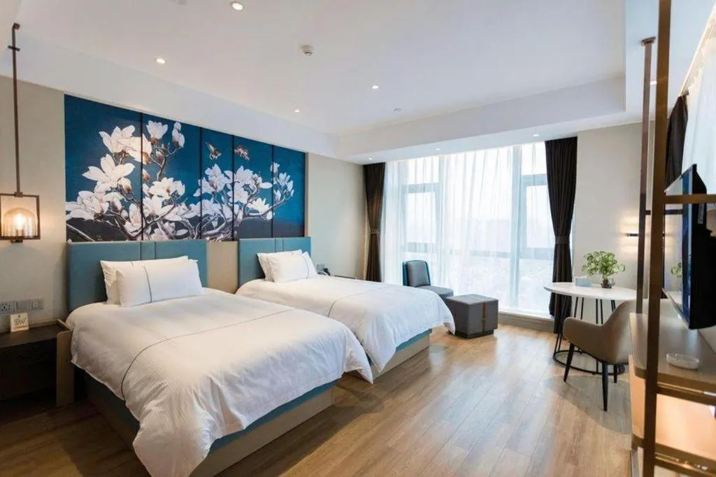 Bed in Magnotel Hotel Guangyuan Nanhe Bus Station Beijing Road