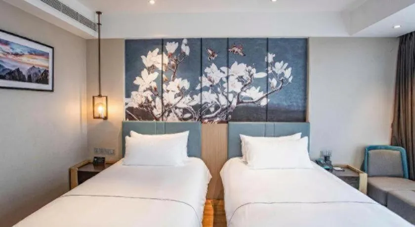 Bed in Magnotel Hotel Guangyuan Nanhe Bus Station Beijing Road