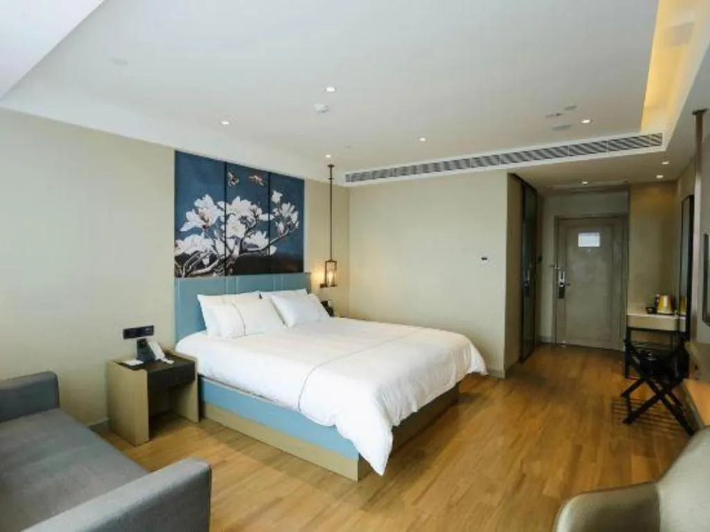 Bed in Magnotel Hotel Guangyuan Nanhe Bus Station Beijing Road