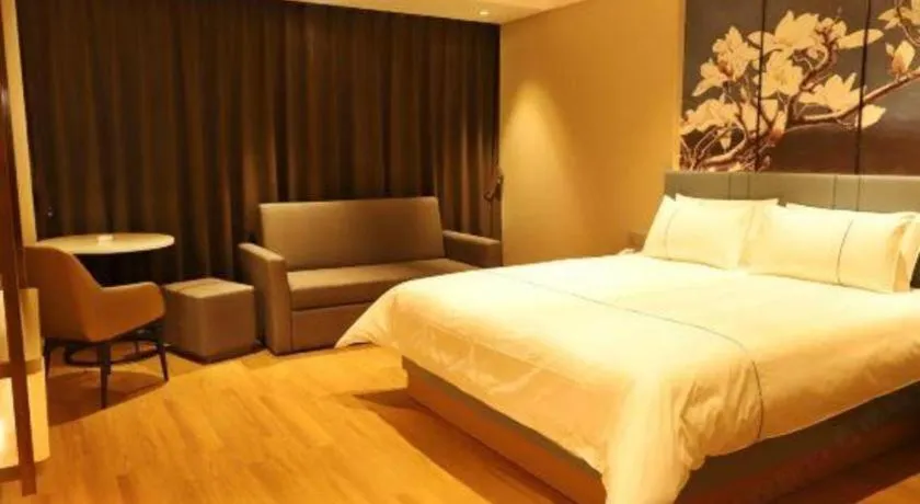 Bed in Magnotel Hotel Guangyuan Nanhe Bus Station Beijing Road