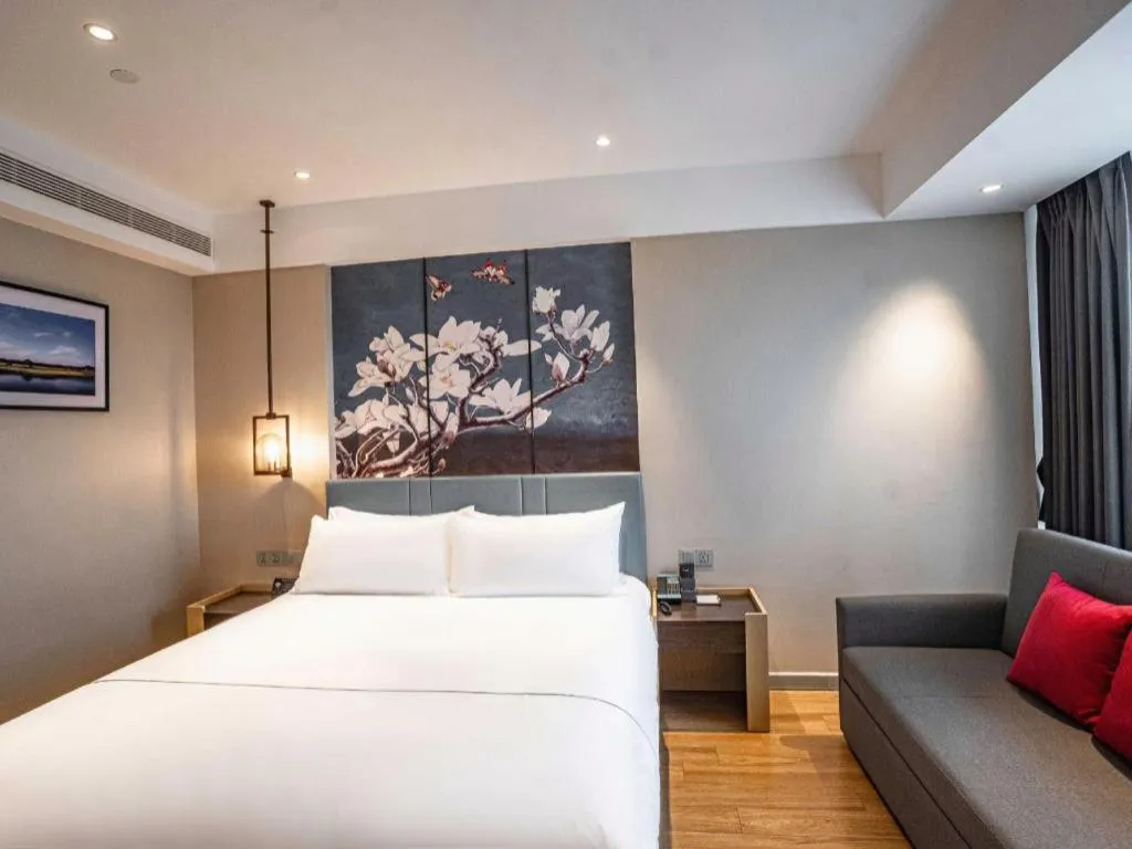 Bed in Magnotel Hotel Guangyuan Nanhe Bus Station Beijing Road