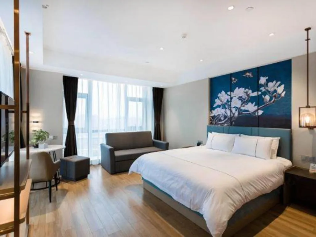 Bed in Magnotel Hotel Guangyuan Nanhe Bus Station Beijing Road