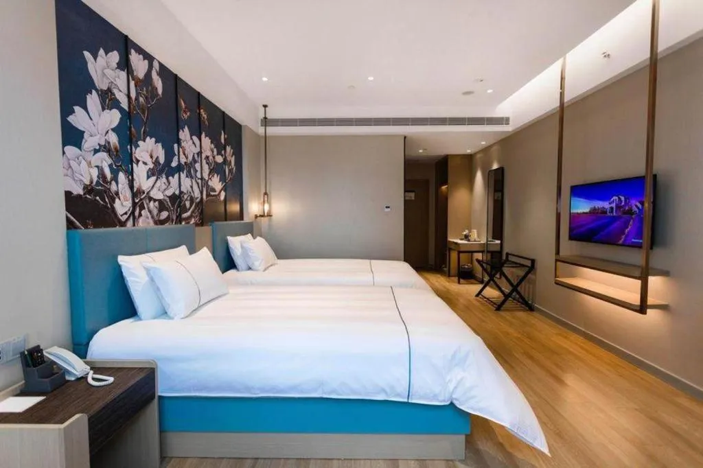 Bed in Magnotel Hotel Guangyuan Nanhe Bus Station Beijing Road