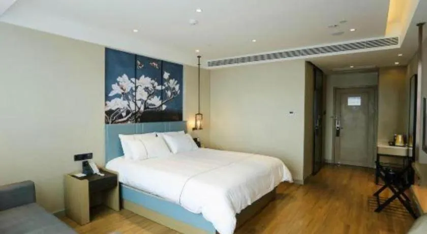 Bed in Magnotel Hotel Guangyuan Nanhe Bus Station Beijing Road