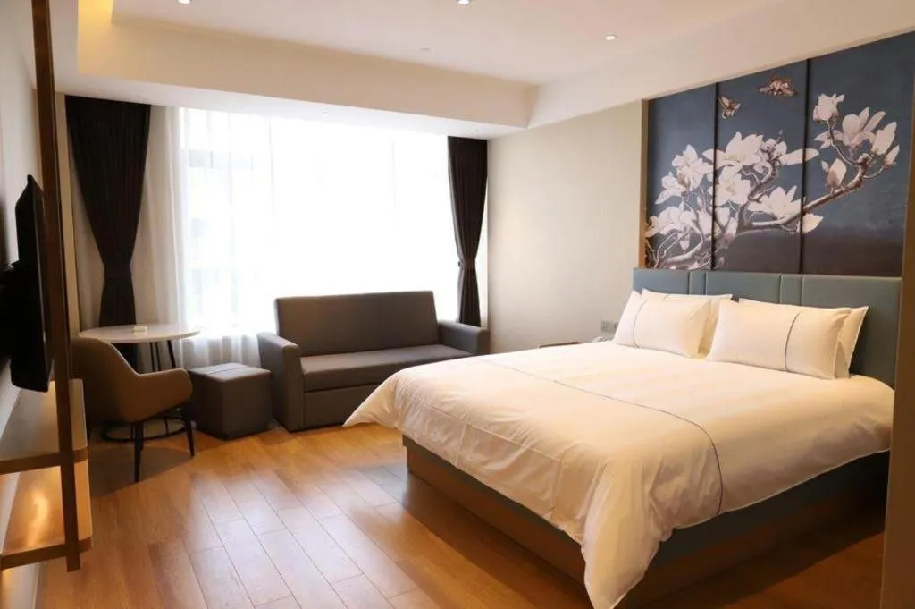 Bed in Magnotel Hotel Guangyuan Nanhe Bus Station Beijing Road