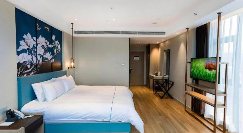 Bed in Magnotel Hotel Guangyuan Nanhe Bus Station Beijing Road