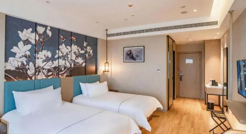 Bed in Magnotel Hotel Guangyuan Nanhe Bus Station Beijing Road