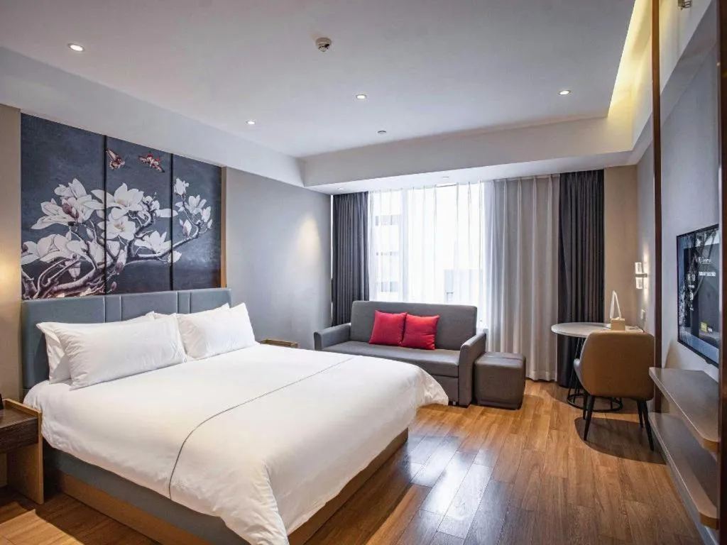 Bed in Magnotel Hotel Guangyuan Nanhe Bus Station Beijing Road