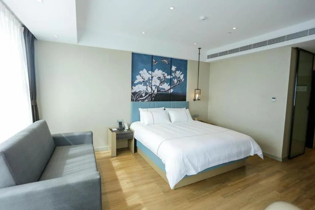 Bed in Magnotel Hotel Guangyuan Nanhe Bus Station Beijing Road