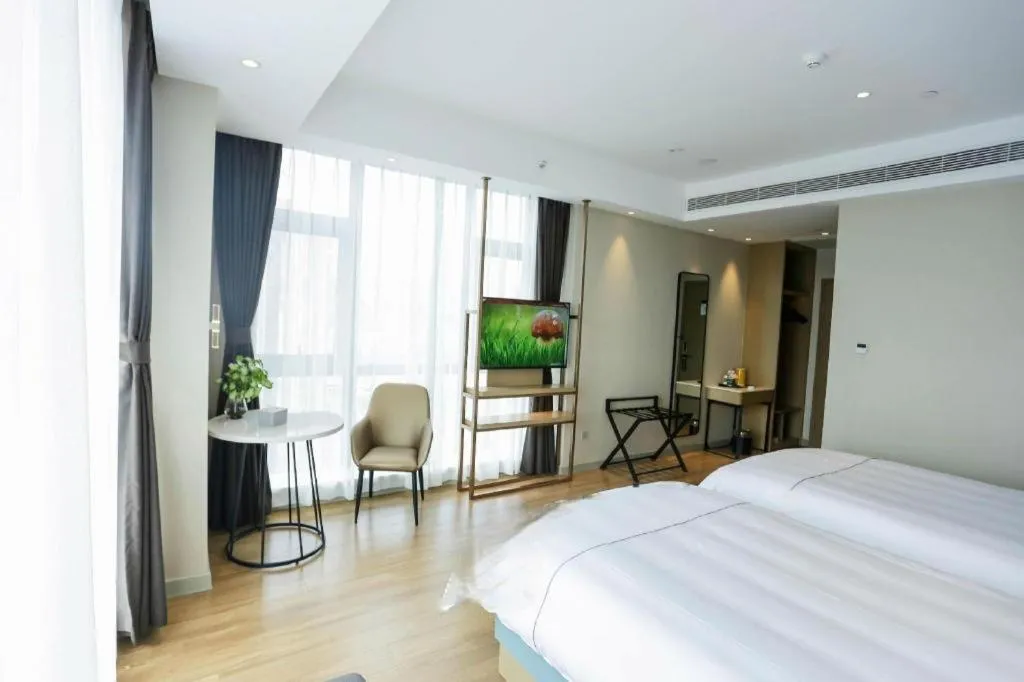 Bed in Magnotel Hotel Guangyuan Nanhe Bus Station Beijing Road