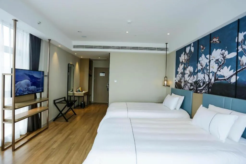 Bed in Magnotel Hotel Guangyuan Nanhe Bus Station Beijing Road