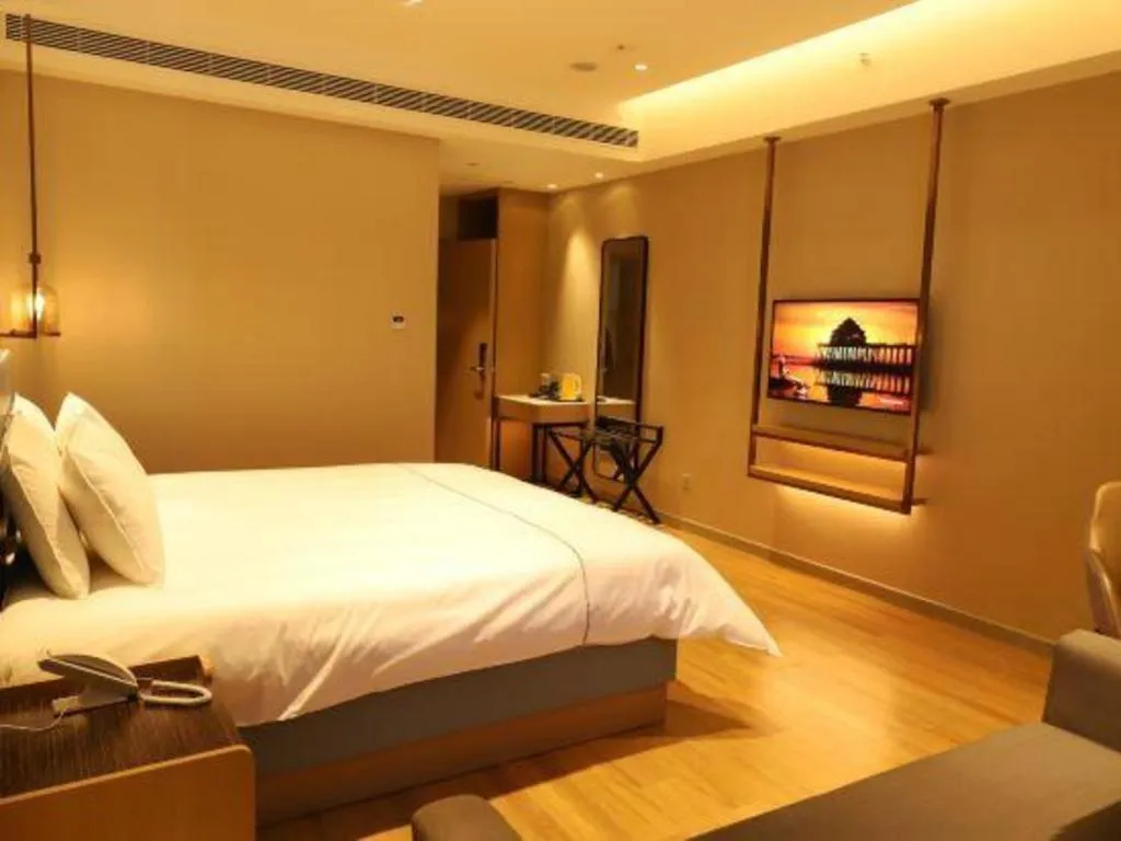 Bed in Magnotel Hotel Guangyuan Nanhe Bus Station Beijing Road