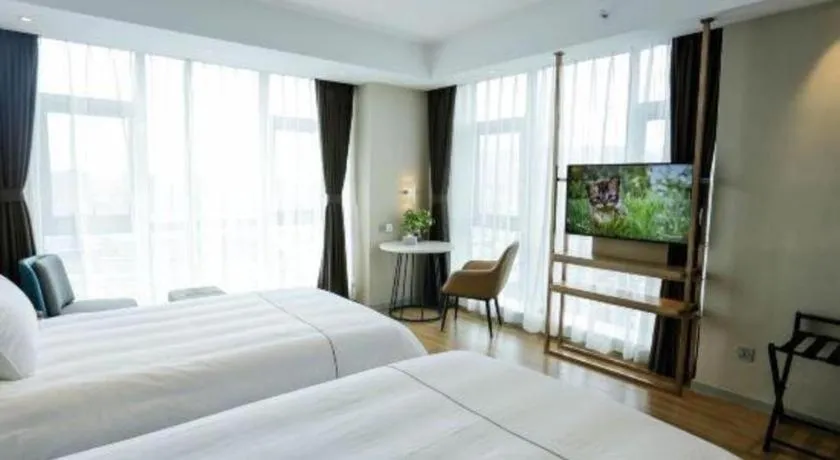 Bed in Magnotel Hotel Guangyuan Nanhe Bus Station Beijing Road