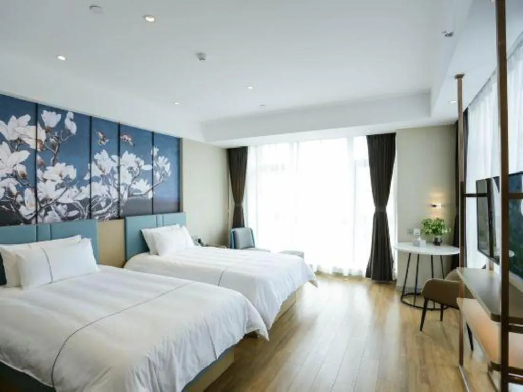 Bed in Magnotel Hotel Guangyuan Nanhe Bus Station Beijing Road