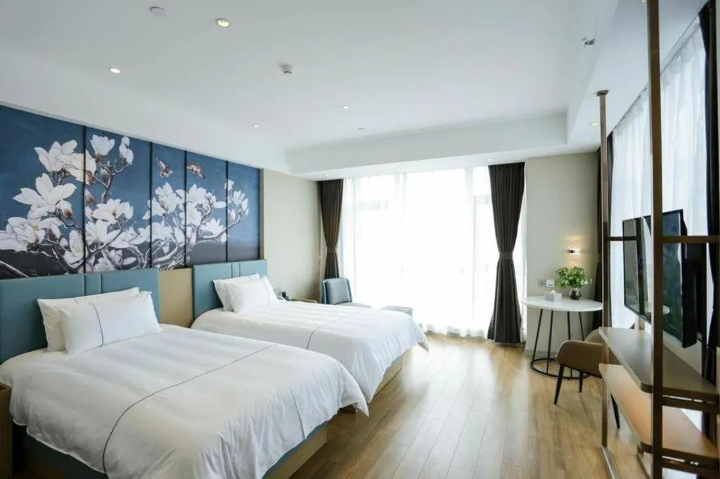 Bed in Magnotel Hotel Guangyuan Nanhe Bus Station Beijing Road