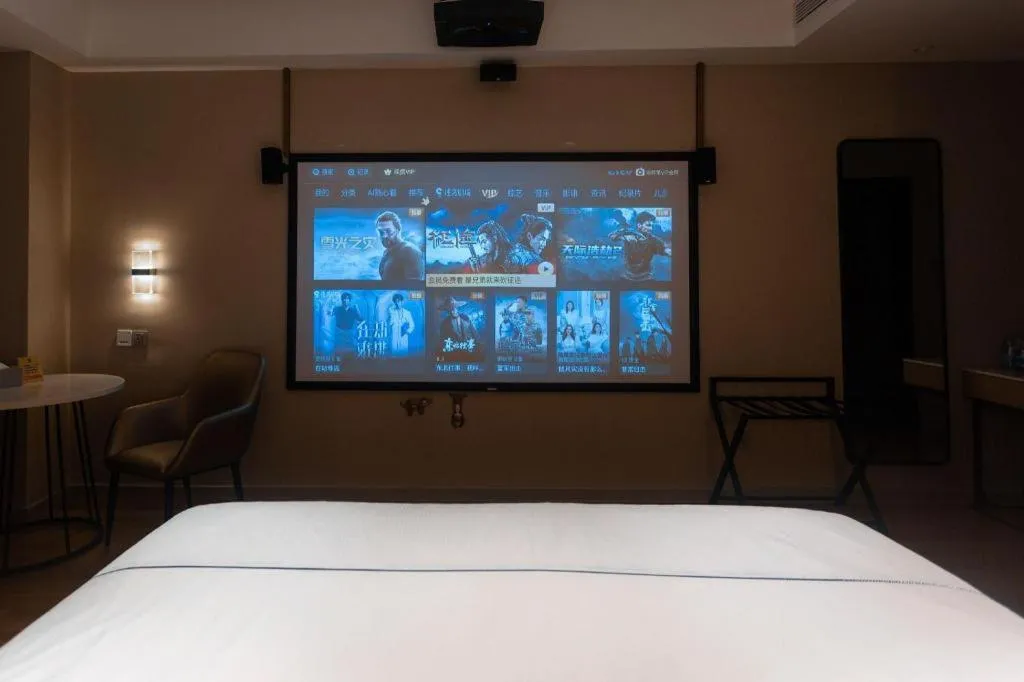 Bed in Magnotel Hotel Guangyuan Nanhe Bus Station Beijing Road