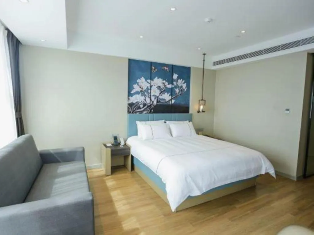 Bed in Magnotel Hotel Guangyuan Nanhe Bus Station Beijing Road