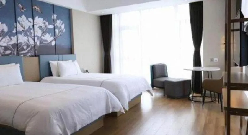 Bed in Magnotel Hotel Guangyuan Nanhe Bus Station Beijing Road