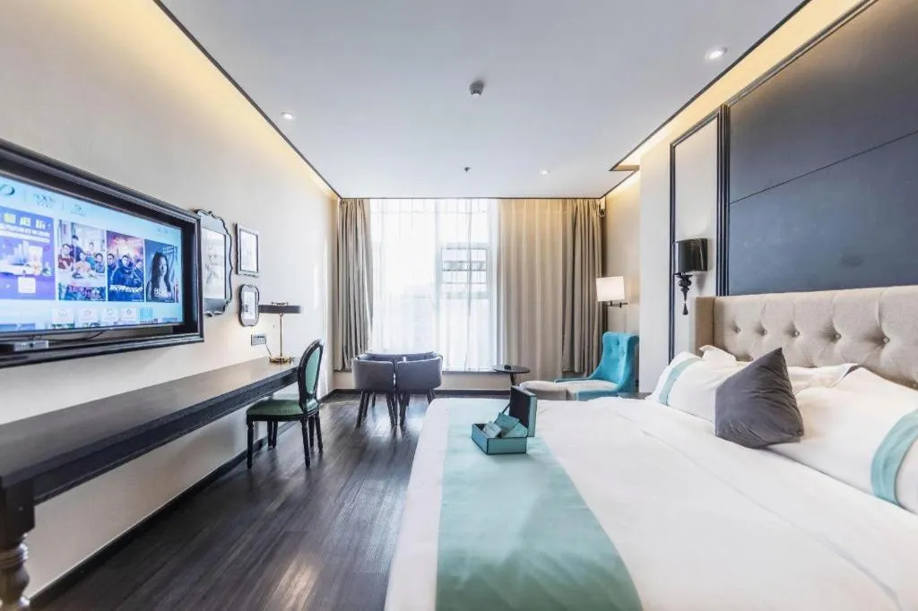 Bed in Xana Hotelle Binzhou Yangxin