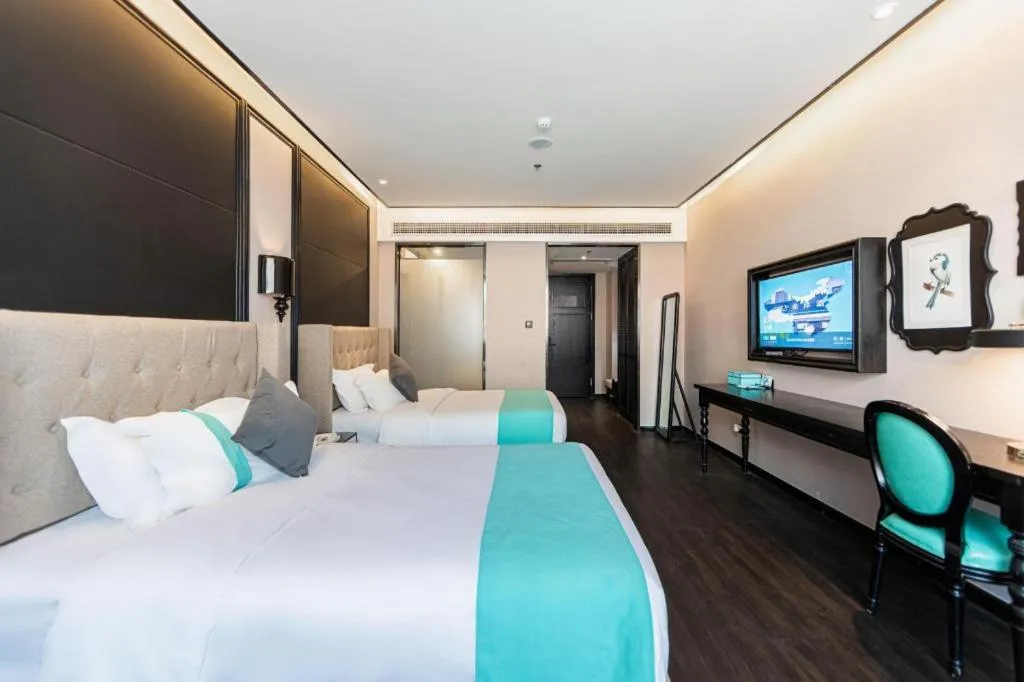 Bed in Xana Hotelle Binzhou Yangxin