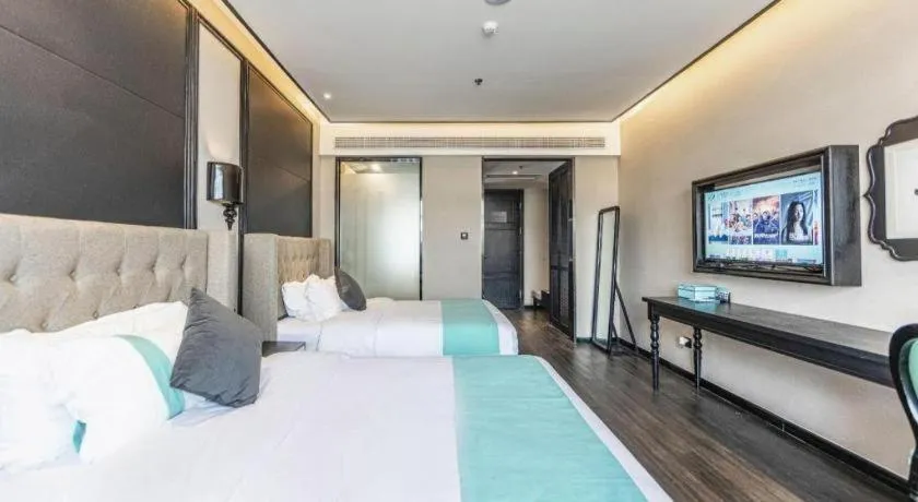 Bed in Xana Hotelle Binzhou Yangxin