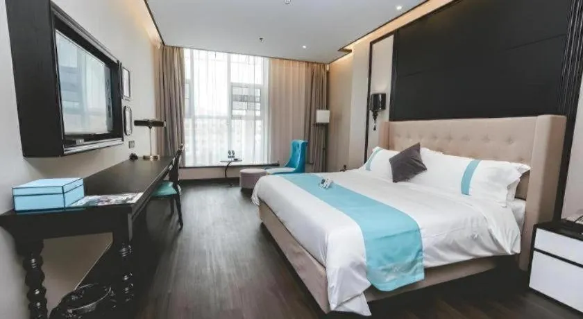 Bed in Xana Hotelle Binzhou Yangxin