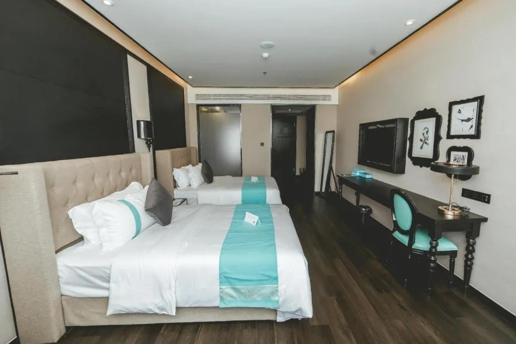 Bed in Xana Hotelle Binzhou Yangxin