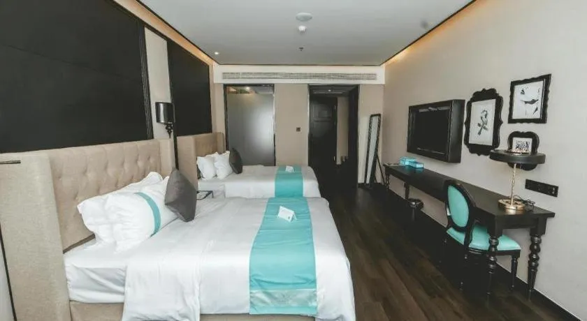 Bed in Xana Hotelle Binzhou Yangxin