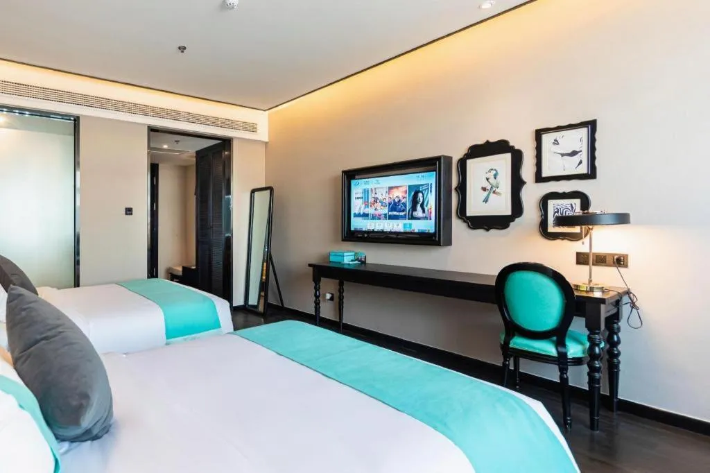 Bed in Xana Hotelle Binzhou Yangxin