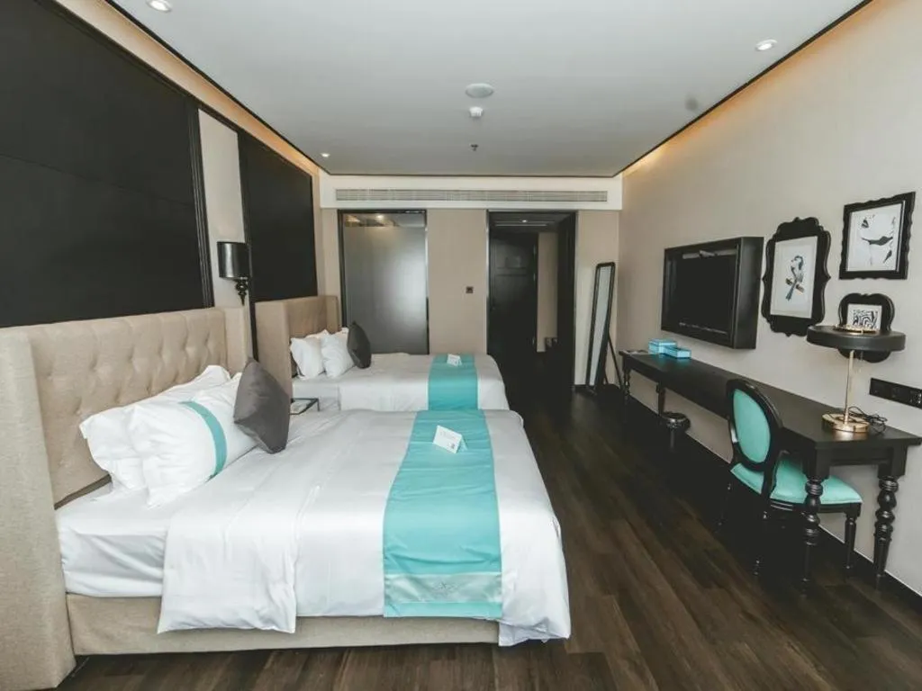 Bed in Xana Hotelle Binzhou Yangxin