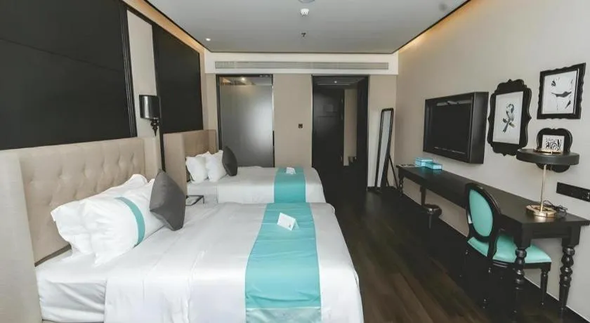 Bed in Xana Hotelle Binzhou Yangxin