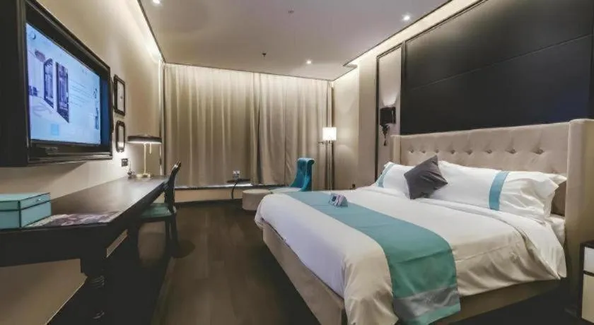 Bed in Xana Hotelle Binzhou Yangxin