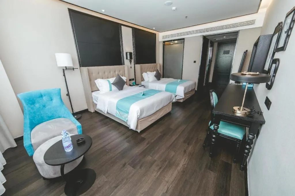 Bed in Xana Hotelle Binzhou Yangxin