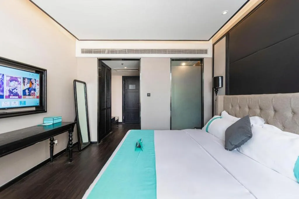 Bed in Xana Hotelle Binzhou Yangxin