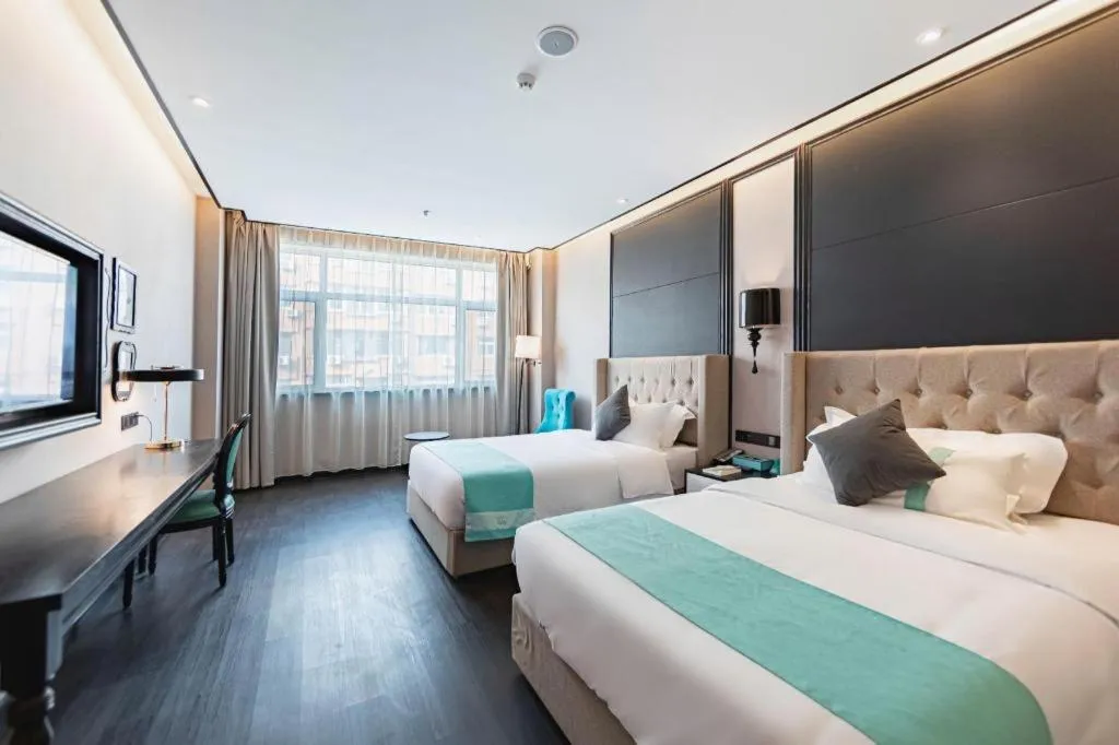 Bed in Xana Hotelle Binzhou Yangxin