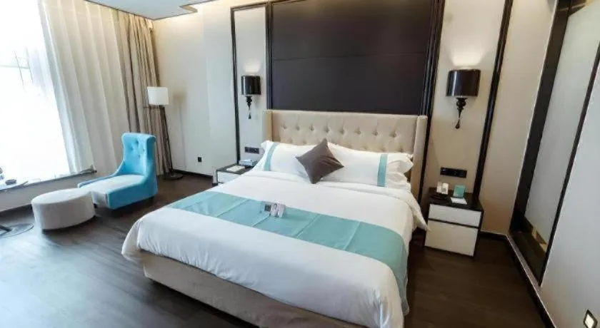 Bed in Xana Hotelle Binzhou Yangxin