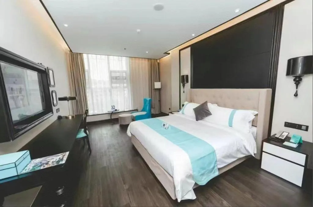 Bed in Xana Hotelle Binzhou Yangxin