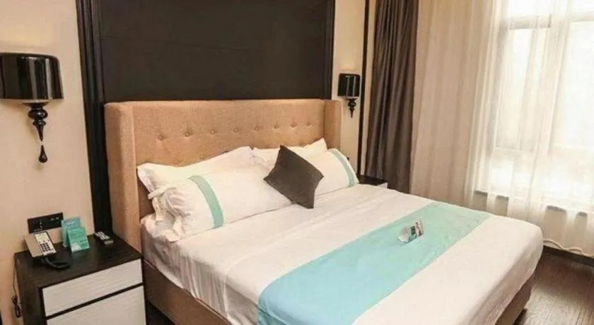 Bed in Xana Hotelle Binzhou Yangxin