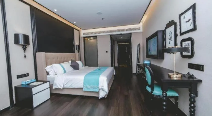 Bed in Xana Hotelle Binzhou Yangxin
