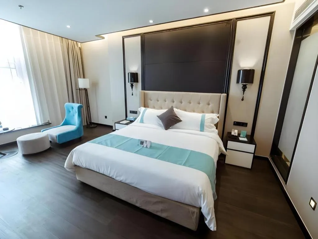 Bed in Xana Hotelle Binzhou Yangxin