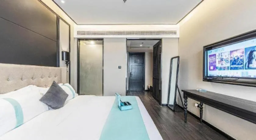 Bed in Xana Hotelle Binzhou Yangxin