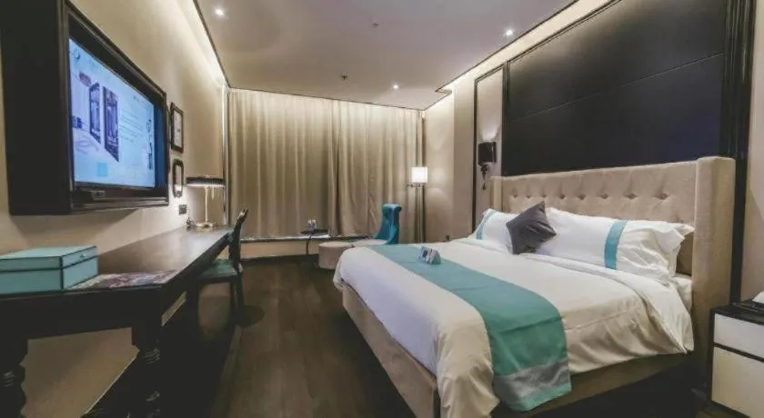 Bed in Xana Hotelle Binzhou Yangxin